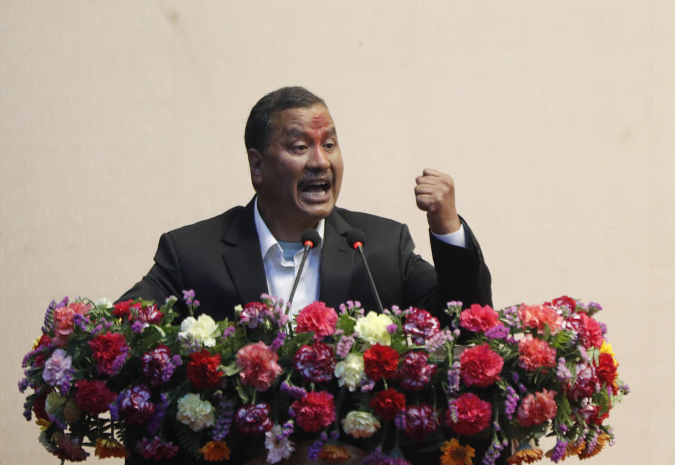 Leader of Nepal Communist Party group Netra Bikram Chand speaks during a signing of peace agreement in Kathmandu, Nepal, Friday, March 5, 2021. Chand, who is better known by his guerrilla name Biplav, emerged out of hiding on Friday after the government lifted a ban on his group so it could take part in the public signing of the peace agreement. This group had split from the Maoist Communist party, which fought government troops between 1996 and 2006, when it gave up its armed revolt, agreed to U.N.-monitored peace talks and joined mainstream politics. (AP Photo/Niranjan Shrestha)