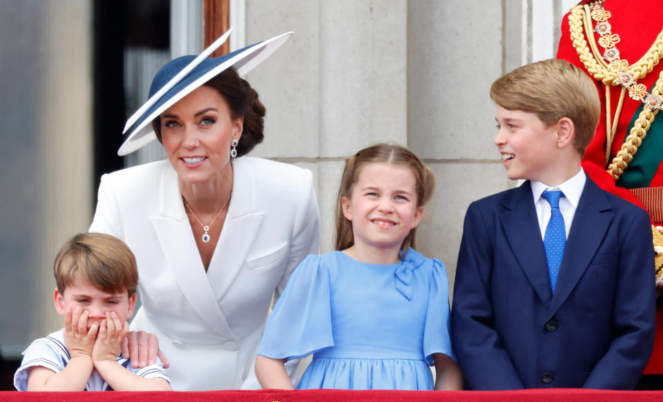 LONDON, UNITED KINGDOM - JUNE 02: (EMBARGOED FOR PUBLICATION IN UK NEWSPAPERS UNTIL 24 HOURS AFTER CREATE DATE AND TIME) Prince Louis of Cambridge, Catherine, Duchess of Cambridge, Princess Charlotte of Cambridge and Prince George of Cambridge watch a flypast from the balcony of Buckingham Palace during Trooping the Colour on June 2, 2022 in London, England. Trooping The Colour, also known as The Queen's Birthday Parade, is a military ceremony performed by regiments of the British Army that has taken place since the mid-17th century. It marks the official birthday of the British Sovereign. This year, from June 2 to June 5, 2022, there is the added celebration of the Platinum Jubilee of Elizabeth II in the UK and Commonwealth to mark the 70th anniversary of her accession to the throne on 6 February 1952. (Photo by Max Mumby/Indigo/Getty Images)