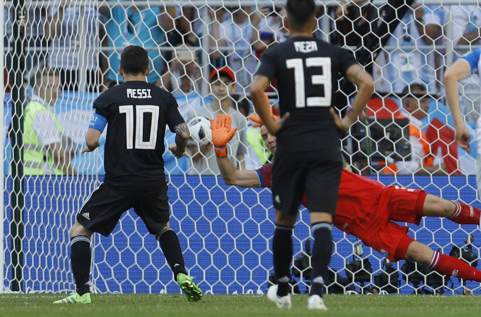 Iceland goalkeeper Hannes Halldorsson makes a save after penalty shot of Argentina’s Lionel Messi, left, during the group D match between Argentina and Iceland at the 2018 soccer World Cup in the Spartak Stadium in Moscow, Russia, Saturday, June 16, 2018. (AP Photo/Victor Caivano)