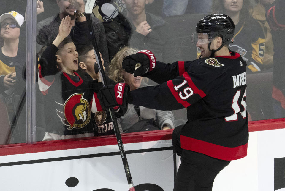 Ottawa Senators right wing Drake Batherson celebrates his game winning goal in overtime against the Pittsburgh Penguins in an NHL hockey game, Tuesday, March 12, 2024, Ottawa, Ontario. (Adrian Wyld/The Canadian Press via AP)