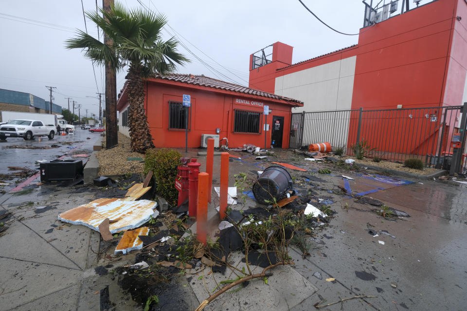 Debris is seen after a possible tornado which damaged several buildings Wednesday, March 22, 2023 in Montebello, Calif. (AP Photo/Ringo H.W. Chiu)
