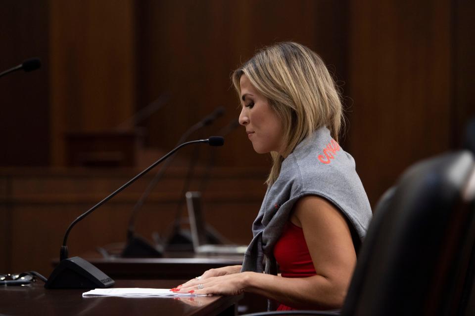 Mary Joyce, a Covenant parent, reads a statement during a House committee meeting where an autopsy records bill was discussed and voted on at Cordell Hull State Office Building in Nashville, Tenn., Wednesday, Aug. 23, 2023.