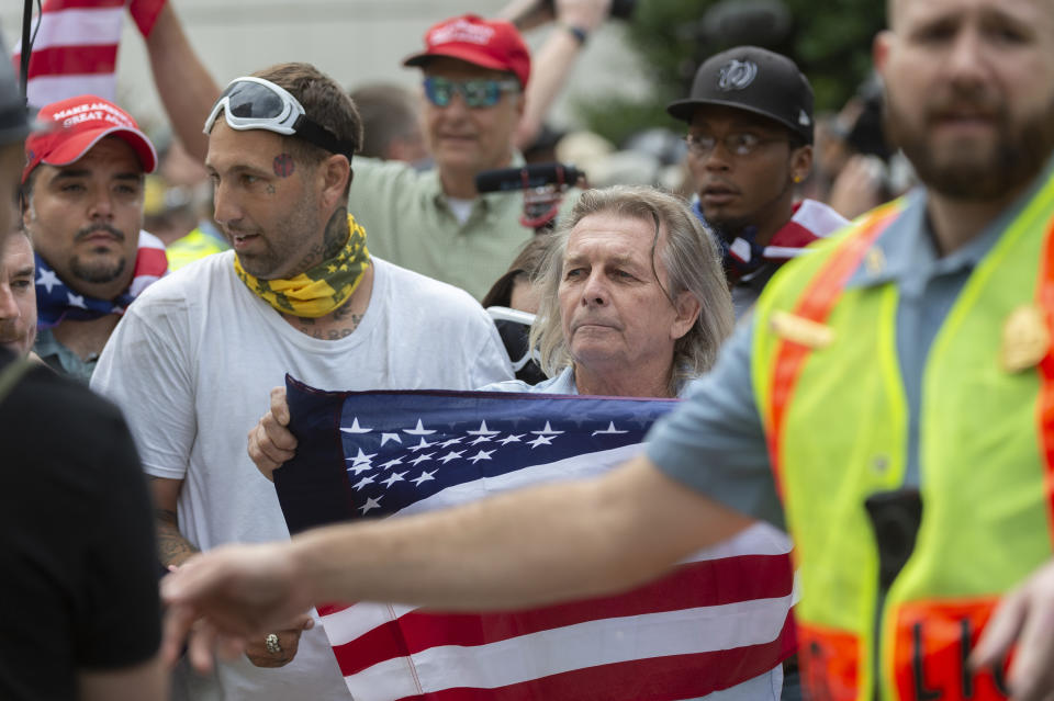 White nationalists march to Lafayette Square during the "Unite the Right 2" rally in Washington, Sunday, Aug. 12, 2018. (Craig Hudson/Charleston Gazette-Mail via AP)