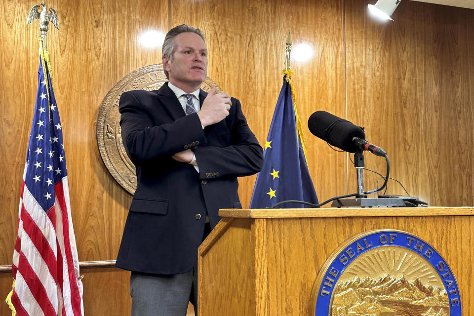 Alaska Republican Gov. Mike Dunleavy speaks to reporters during a news conference on topics including education, Wednesday, Feb. 7, 2024, in Juneau, Alaska. Dunleavy, a former educator, is advocating an approach to K-12 education that includes promoting charter schools and the payment of bonuses to teachers as a way to keep them on the job. (AP Photo/Becky Bohrer)