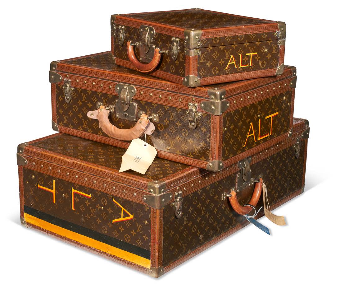 A set of three personalized Louis Vuitton suitcases, circa 1990, owned by Andre Leon Talley will be sold at auction.