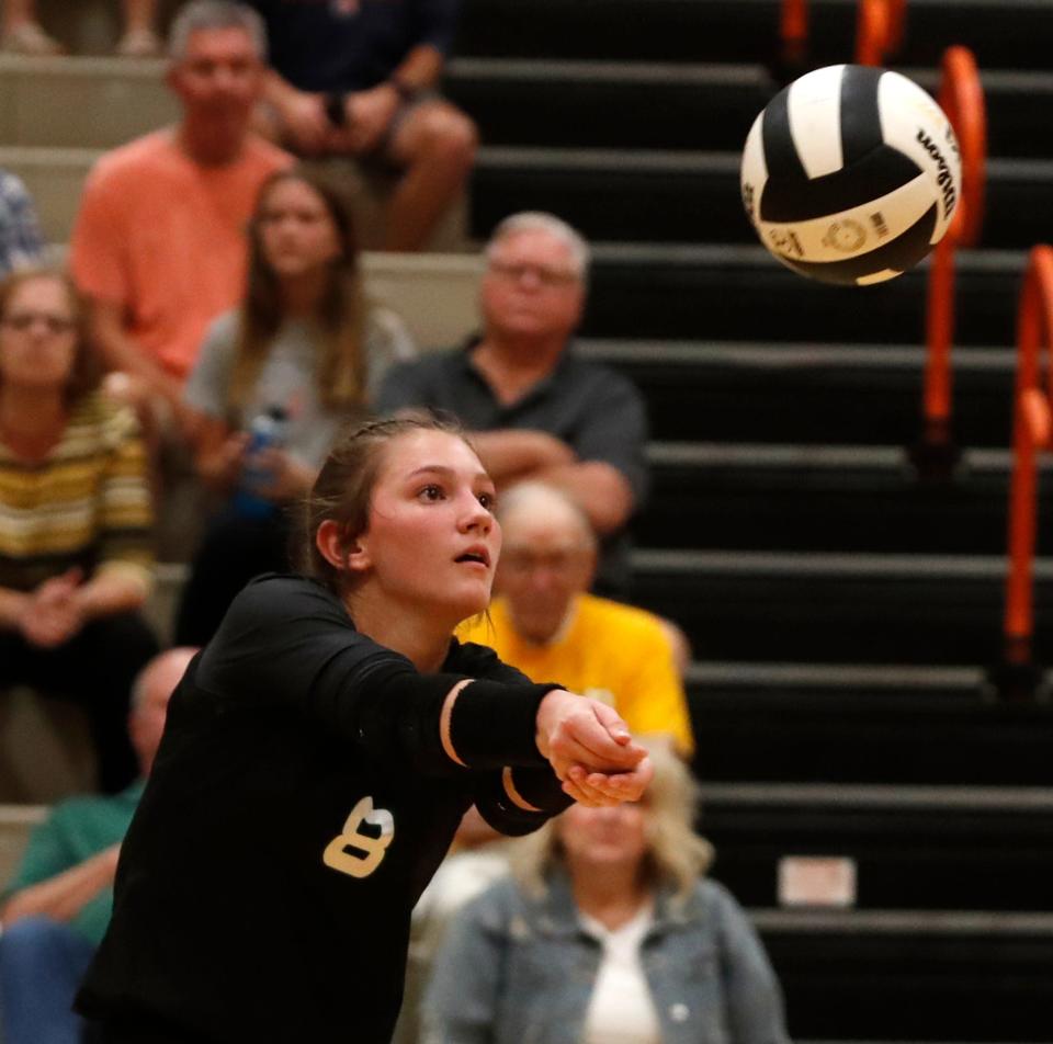 Benton Central’s Cali Foster (8) hits the ball during the IHSAA volleyball match against Harrison, Tuesday, Aug. 16, 2022, at Harrison High School in West Lafayette, Ind.