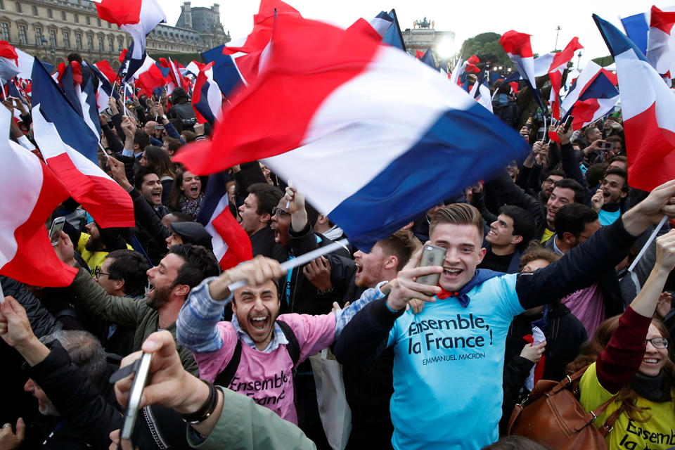 <p>Supporters of French presidential candidate Emmanuel Macron celebrate near the Louvre museum after results were announced in the second-round vote of the 2017 French presidential elections, in Paris, May 7, 2017. (Benoit Tessier/Reuters) </p>