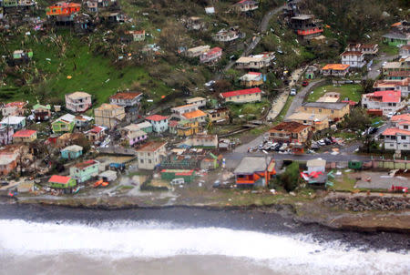 Damaged homes from Hurricane Maria are shown in this aerial photo over the island of Dominica, September 19, 2017. Photo taken September 19, 2017. Courtesy Nigel R. Browne/Caribbean Disaster Emergency Management Agency/Regional Security System/Handout via REUTERS