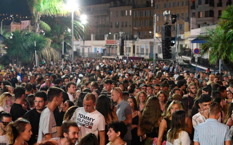 Crowds gather for the concert in Nice - YANN COATSALIOU/AFP via Getty Images
