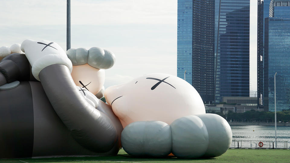 The 42m-long KAWS artwork, of the artist's Companion character, seen at The Float @ Marina Bay on Friday (12 November). (PHOTO: Dhany Osman / Yahoo News Singapore)