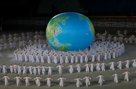 Participants perform around a globe highlighting Korean peninsula at Mass Games in May Day stadium marking the 70th anniversary of North Korea's foundation in Pyongyang, North Korea, September 9, 2018. REUTERS/Danish Siddiqui