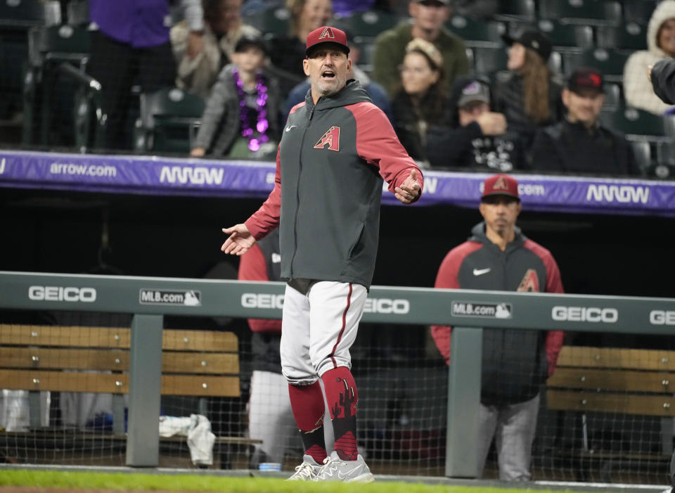 Arizona Diamondbacks manager Torey Lovullo reacts after he was ejected along with Ketel Marte for arguing with home plate umpire Hunter Wendelstedt in the seventh inning of a baseball game against the Colorado Rockies, Saturday, Sept. 10, 2022, in Denver. (AP Photo/David Zalubowski)