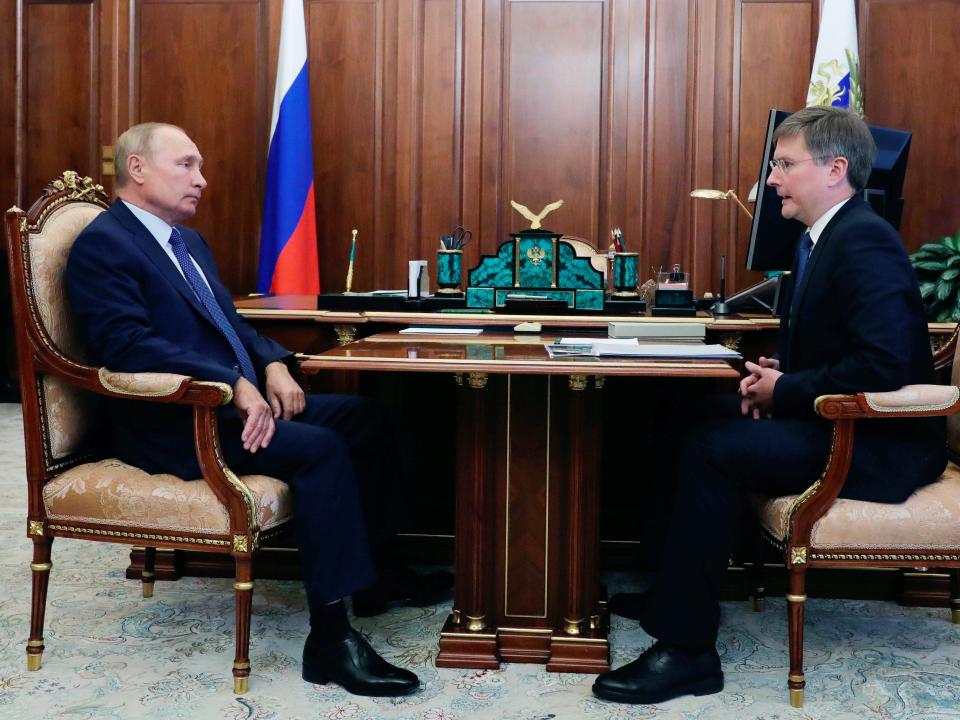 Russia&#39;s President Vladimir Putin (L) meets with Sergei Ivanov, CEO of the Alrosa diamond mining company, at the Moscow Kremlin.