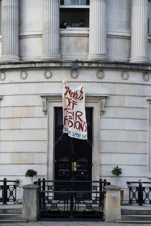 Students from the Fine Art school at the University College of London hang a banner supporting lecturer strikes in London, Britain February 22, 2018. REUTERS/Peter Summers