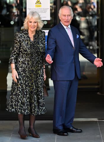 <p>Samir Hussein/WireImage</p> Queen Camilla and King Charles visit a cancer hospital in London on April 30, 2024
