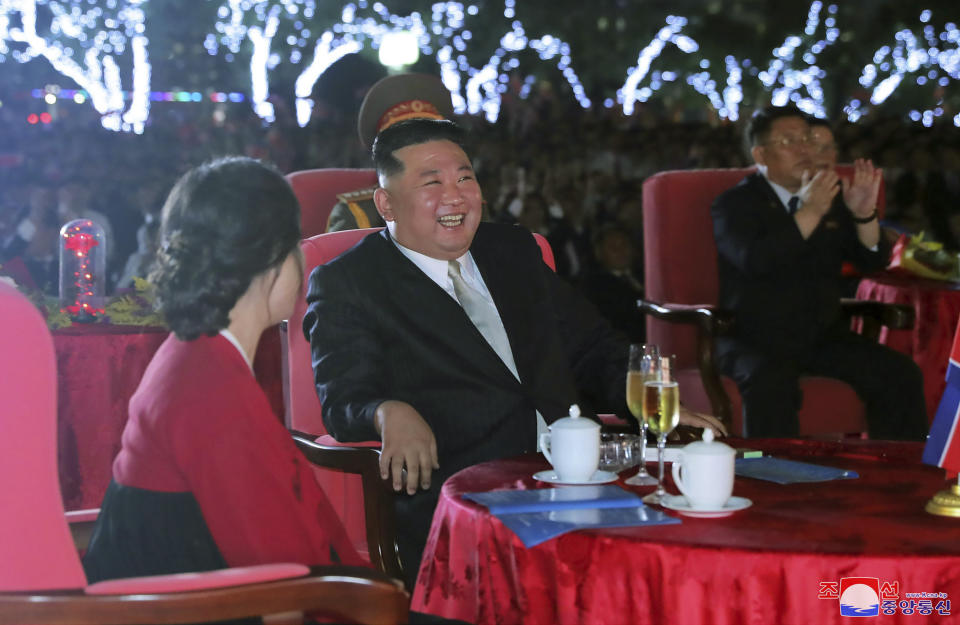 This photo provided by the North Korean government shows North Korean leader Kim Jong Un, center, and his wife Ri Sol Ju, left, watch a performance during a celebration marking the nation's 74th anniversary in Pyongyang, North Korea, on Sept. 8, 2022. Independent journalists were not given access to cover the event depicted in this image distributed by the North Korean government. The content of this image is as provided and cannot be independently verified. Korean language watermark on image as provided by source reads: "KCNA" which is the abbreviation for Korean Central News Agency. (Korean Central News Agency/Korea News Service via AP)