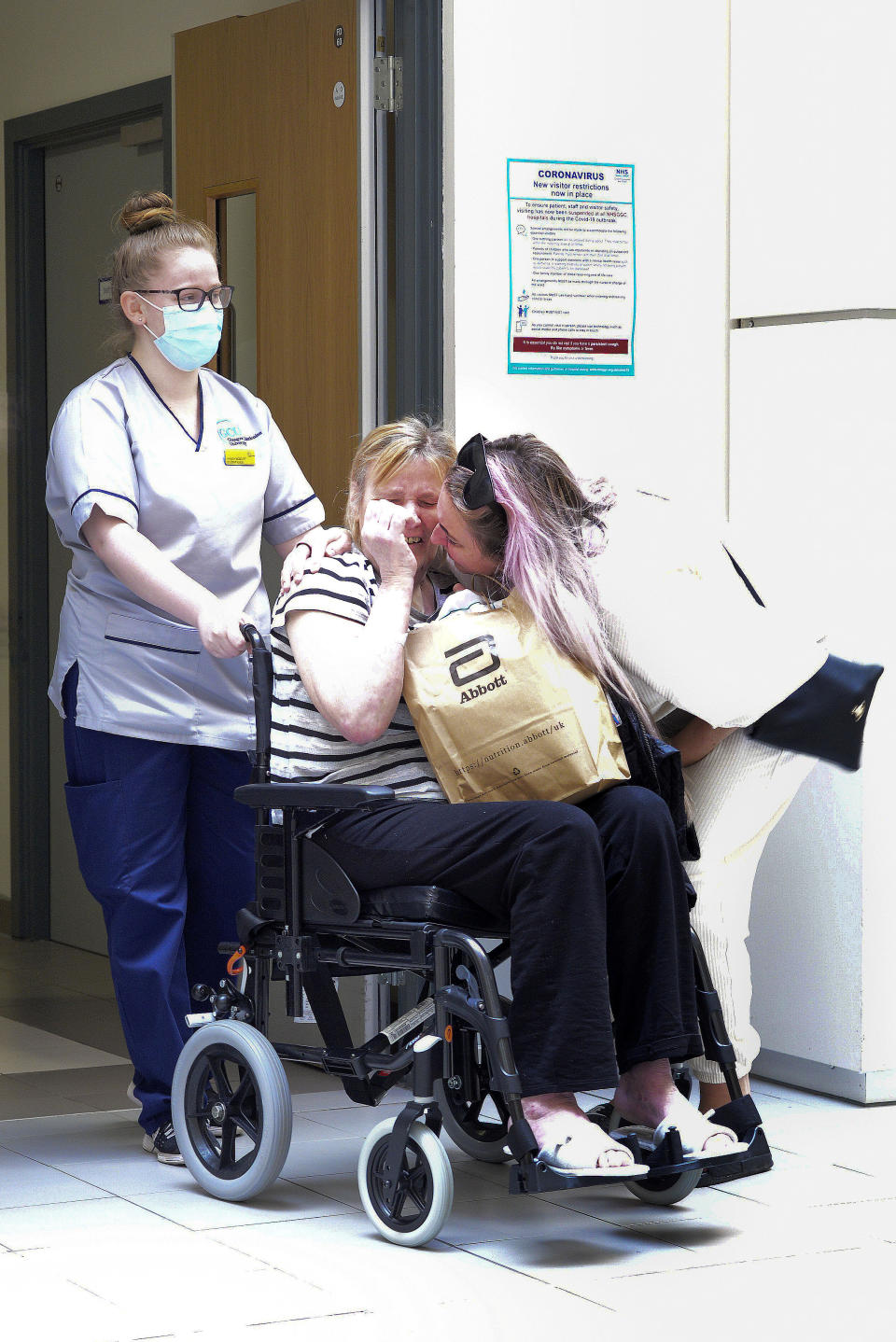 Ann McFayden leaves the Queen Elizabeth University Hospital in Glasgow (Picture: SWNS)