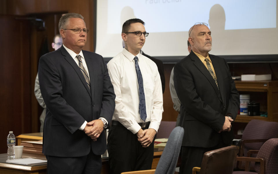 Paul Bellar, middle, appears before Jackson County Circuit Court Judge Thomas Wilson on Wednesday, Oct. 5, 2022 for trial in Jackson, Mich. Paul Bellar, Joseph Morrison and Pete Musico are charged in connection with a 2020 anti-government plot to kidnap Michigan Gov. Gretchen Whitmer. (J. Scott Park/Jackson Citizen Patriot via AP, Pool)