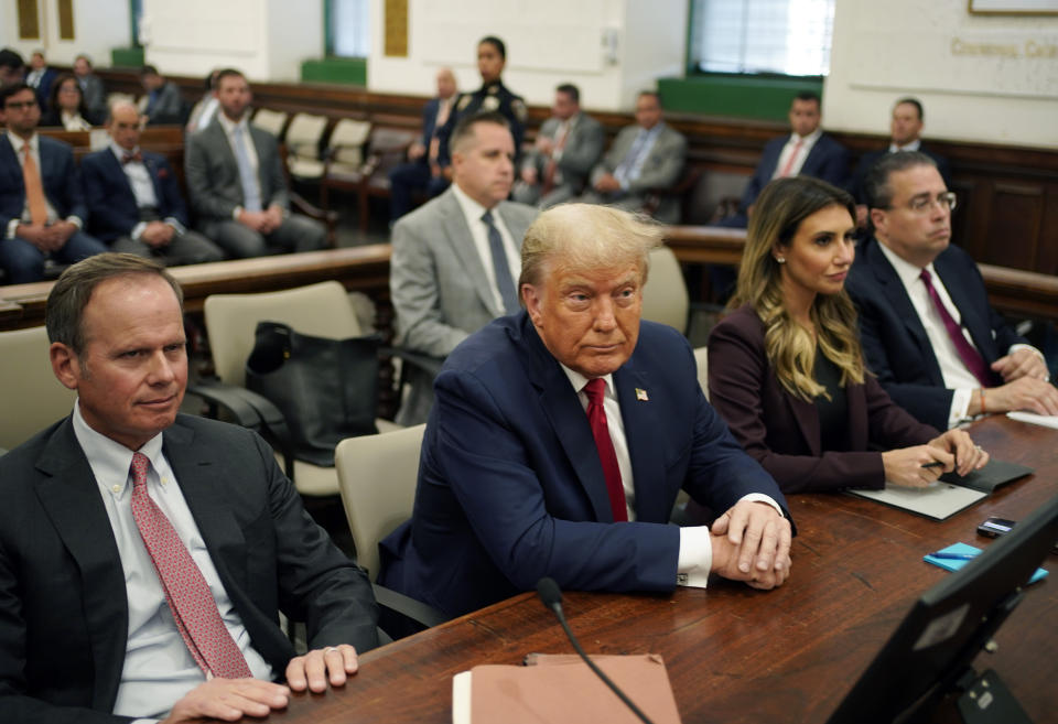Former President Donald Trump sits in the courtroom with his legal team before the continuation of his civil business fraud trial at New York Supreme Court, Tuesday, Oct. 17, 2023, in New York. (AP Photo/Seth Wenig, Pool)
