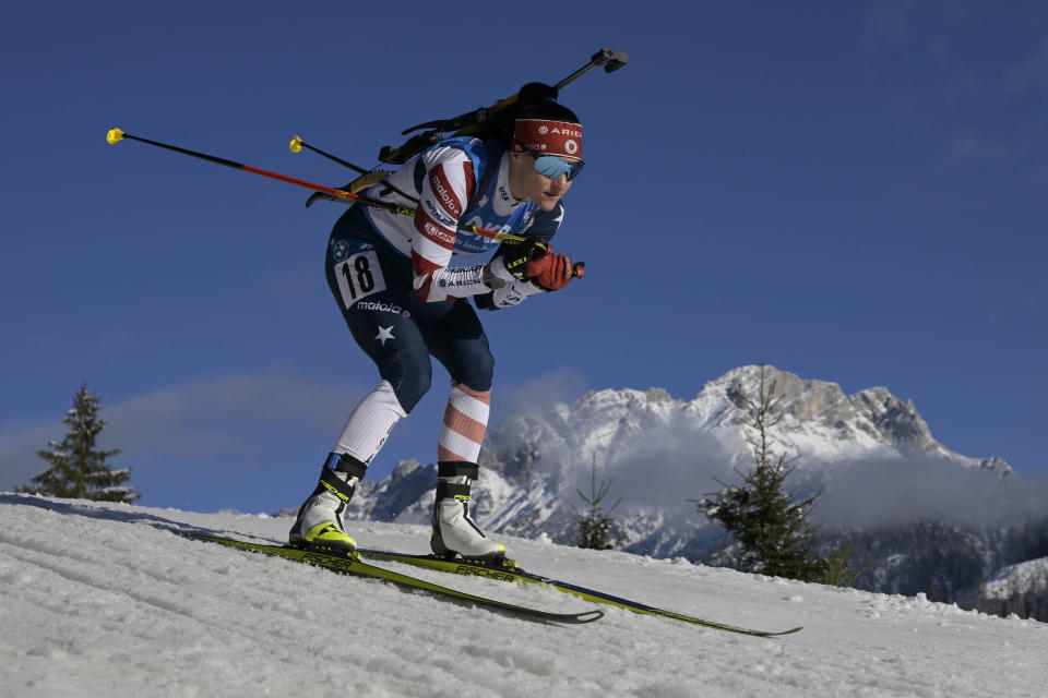FILE - Joanne Reid of the United States competes during the women 7.5km sprint competition at the Biathlon World Cup race in Hochfilzen, Austria, Thursday, Dec. 8, 2022. The United States Biathlon national champion was sexually harassed and abused for years by a ski-wax technician while racing on the sport's elite World Cup circuit, investigators found. When the two-time Olympian complained, Reid said she was told his behavior was just part of the male European culture. (AP Photo/Andreas Schaad, File)