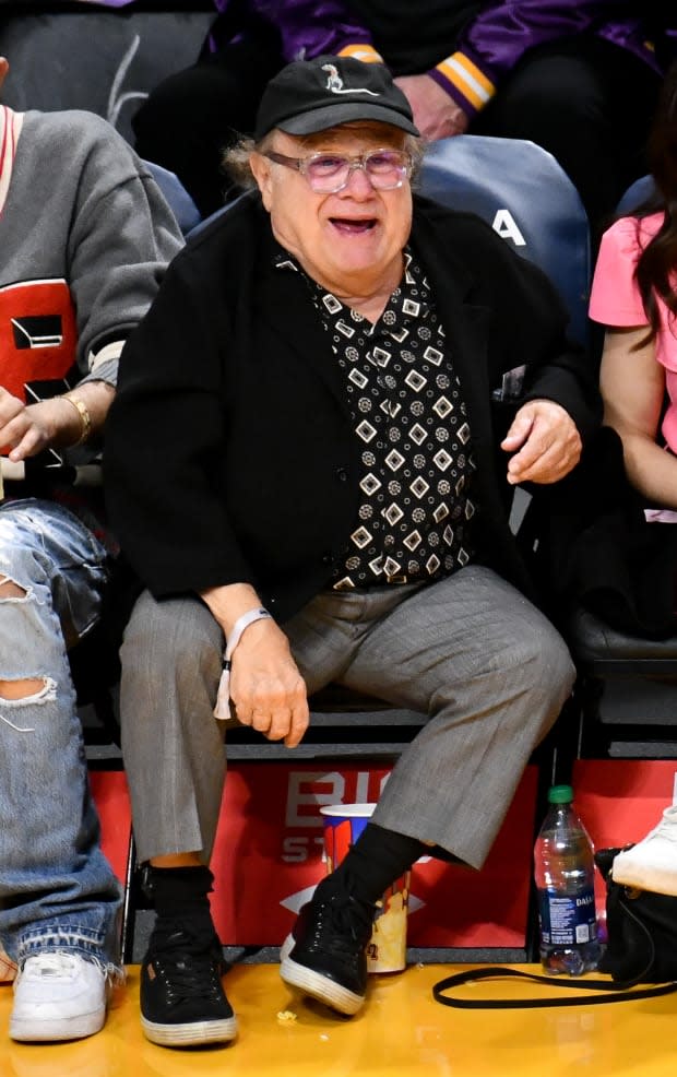 Danny DeVito attends a basketball game between the Los Angeles Lakers and the Sacramento Kings at Crypto.com Arena on Jan. 18, 2023 in Los Angeles.<p><a href="https://www.gettyimages.com/detail/1457561426" rel="nofollow noopener" target="_blank" data-ylk="slk:Allen Berezovsky/Getty Images;elm:context_link;itc:0;sec:content-canvas" class="link ">Allen Berezovsky/Getty Images</a></p>