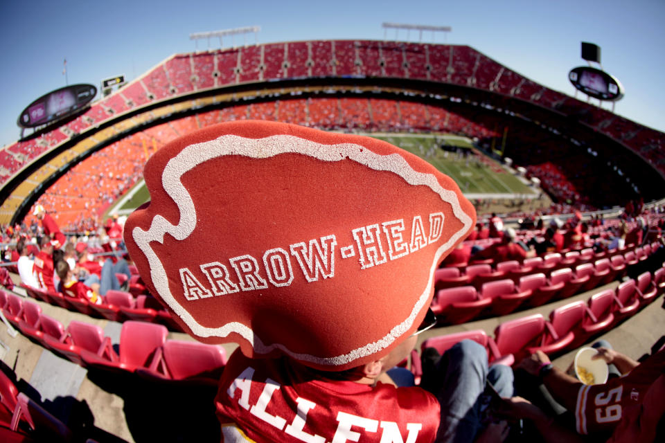 FILE - A Kansas City Chiefs fan watches pregame activities before an NFL football game against the Minnesota Vikings Sunday, Oct. 2, 2011 in Kansas City, Mo. Rhonda LeValdo and dozens of other Indigenous activists from Kansas City and around the country are gathering this weekend in Las Vegas ahead of Sunday’s game to demand that the Kansas City Chiefs change their name, the fan-driven “tomahawk chop” and retire “any and all Native American appropriation owned and used by the team,” according to a statement by Not In Our Honor, the group LeValdo founded and leads. (AP Photo/Charlie Riedel, File)