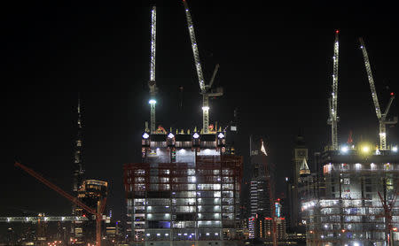 General view of Dubai's cranes at the construction site in Dubai, United Arab Emirates, December 18, 2018. Picture taken December 18, 2018. REUTERS/Satish Kumar