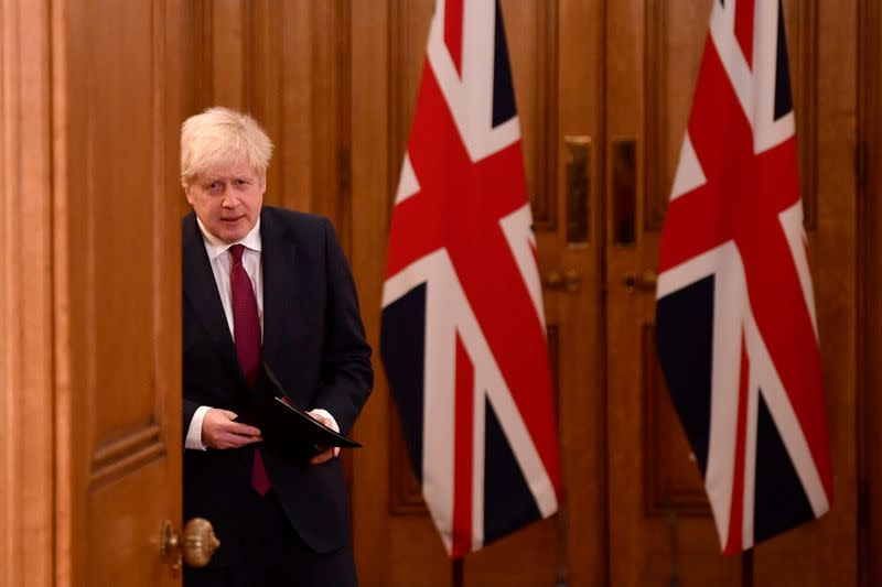 Britain's Prime Minister Boris Johnson holds a news conference in London