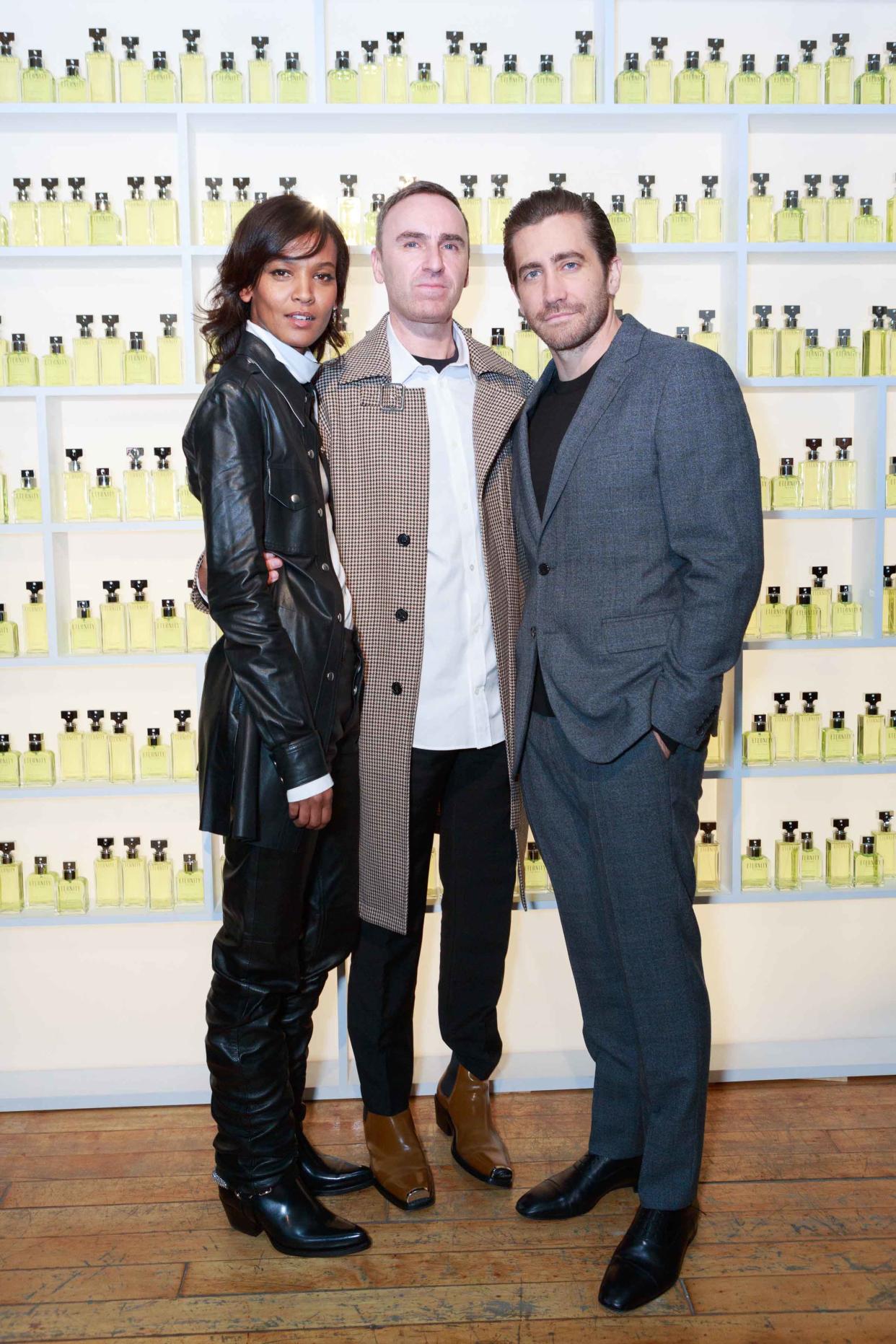 Model and philanthropist Liya Kebede, Calvin Klein chief creative officer Raf Simons, and Nine Stories production co-founder and actor Jake Gyllenhaal at the Calvin Klein Eternity fragrance launch event in New York. (Photo: Courtesy of Coty)