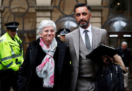 FILE PHOTO: Catalonia's former education minister Clara Ponsati and her lawyer Aamer Anwar leave after Ponsati was bailed following an hearing in Edinburgh, Scotland, Britain, March 28, 2018. REUTERS/Russell Cheyne/File Photo