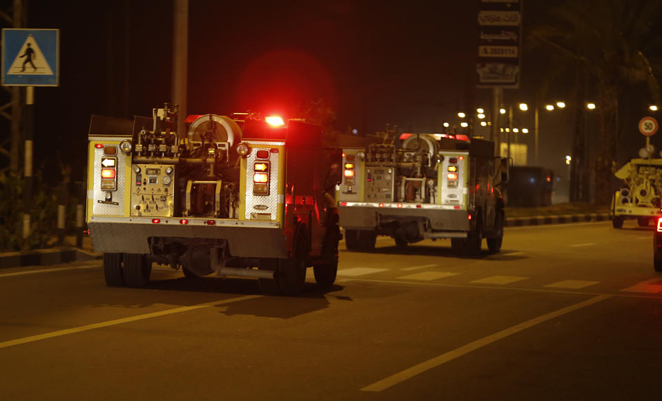 Rescue vehicles, part of a convoy of around 20, arrives in Gaza City, Tuesday, Dec. 17, 2019. Palestinian officials say Israel has allowed the import of around 20 rescue and firefighting vehicles. The equipment was donated by Qatar. (AP Photo/Hatem Moussa)