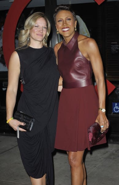 Robin Roberts and Amber Laign standing outside for a full length photo together.