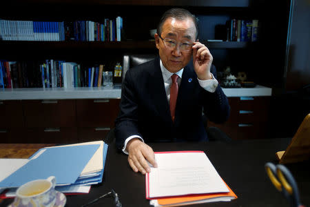 United Nations Secretary General Ban Ki-moon sits at his desk as he poses for a portrait in his office at United Nations Headquarters in the Manhattan borough of New York, New York, U.S., October 21, 2016. REUTERS/Carlo Allegri