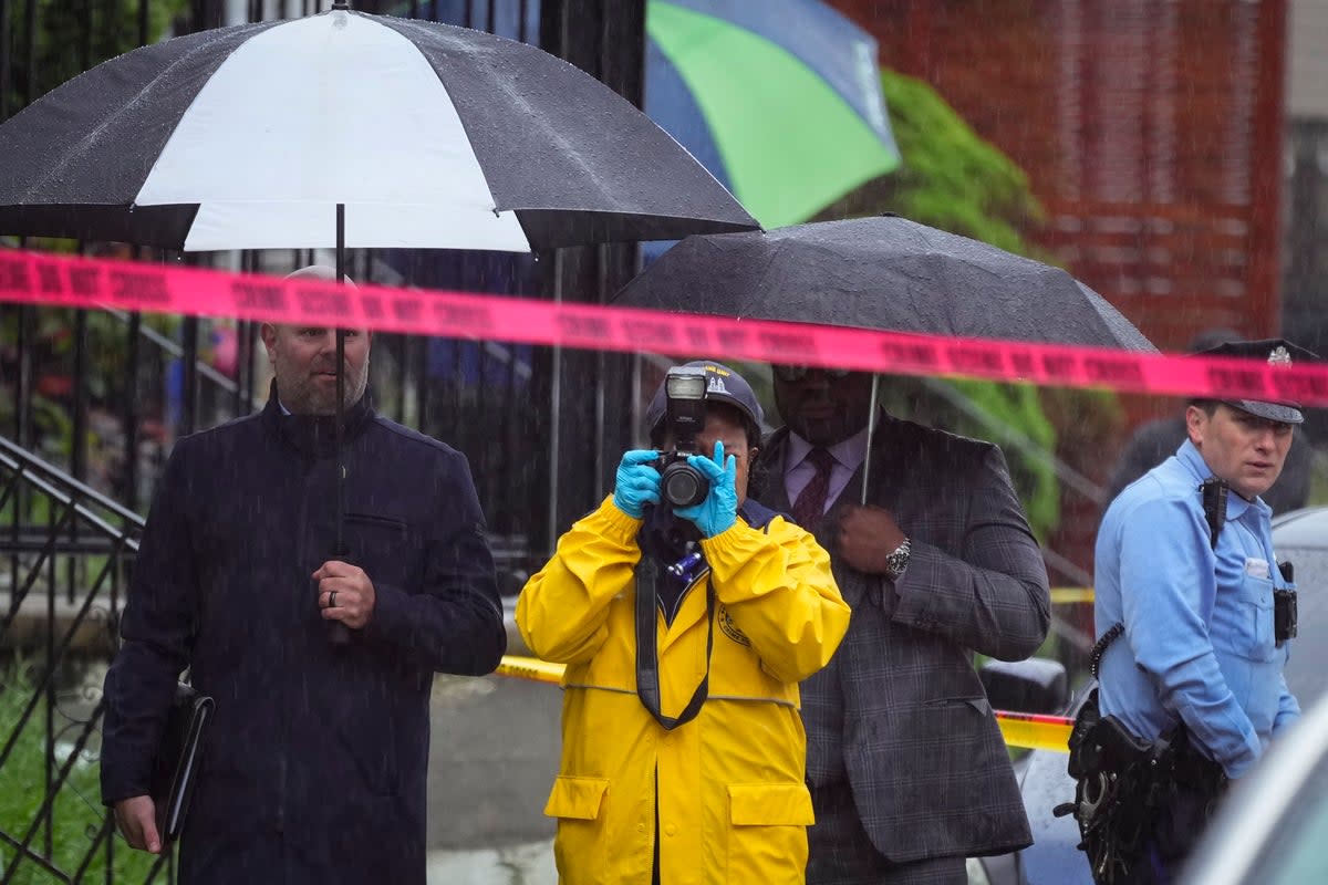 Investigators work the scene (AP)