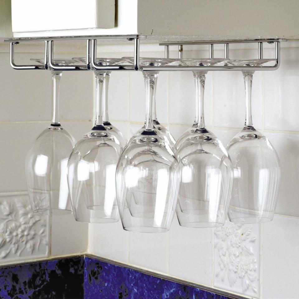 A small space shouldn't prevent you from getting your wine on. <a href="https://www.amazon.com/Oenophilia-Under-Cabinet-Stemware-Rack/dp/B000BNY692/ref=as_at/?creativeASIN=B000BNY692&amp;linkCode=w61&amp;imprToken=wmfgs6e7JTUkmBXAavijRQ&amp;slotNum=9&amp;ie=UTF8&amp;refRID=1VJPPP2FYZS3JTADK221&amp;tag=apartmentth0a-20" target="_blank">Shop it here for $20.</a>