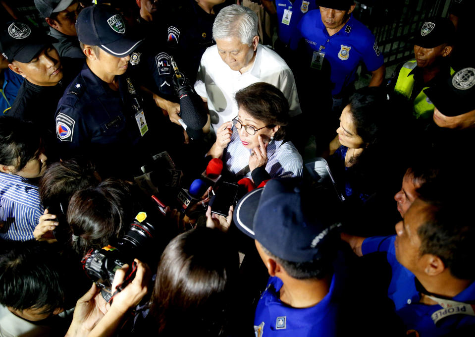 Former Philippine Supreme Court justice Conchita Carpio-Morales talks to reporters upon arrival at the Ninoy Aquino International Airport from Hong Kong where she was stopped by Immigration authorities and was held in a room at Hong Kong's airport and ordered to take a flight back to Manila, Tuesday, May 21, 2019 in suburban Pasay city south of Manila, Philippines. Carpio-Morales, along with former Foreign Affairs Secretary Albert Del Rosario, once accused Chinese President Xi Jinping of crimes against humanity before the International Criminal Court. (AP Photo/Bullit Marquez)