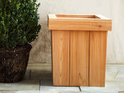 <p>Wooden outdoor planters for flowers or shrubs are inexpensive and easy to build, which is why they're <a rel="nofollow noopener" href="http://www.popularmechanics.com/home/how-to-plans/how-to/a2800/4258852/" target="_blank" data-ylk="slk:popular DIY projects;elm:context_link;itc:0;sec:content-canvas" class="link ">popular DIY projects</a>. Go one step further with yours and adding tile to the sides of the planters to give them a little character. Use certified porcelain tile for this project because it's more impervious to water than other tile and better able to withstand the weather. </p><p>You can adhere the tile directly to the planter's wooden sides, but because wood expands and contracts as the weather changes, you'll probably end up with cracks in your grout lines. Avoid this by screwing cement board to the wood (although this will increase the thickness of the sides) and tiling over that. Also, because water can get into cracks in the grout lines and then freeze and expand, causing the grout to break apart, you can use an outdoor silicone caulk instead. The caulks are available in various colors.</p>