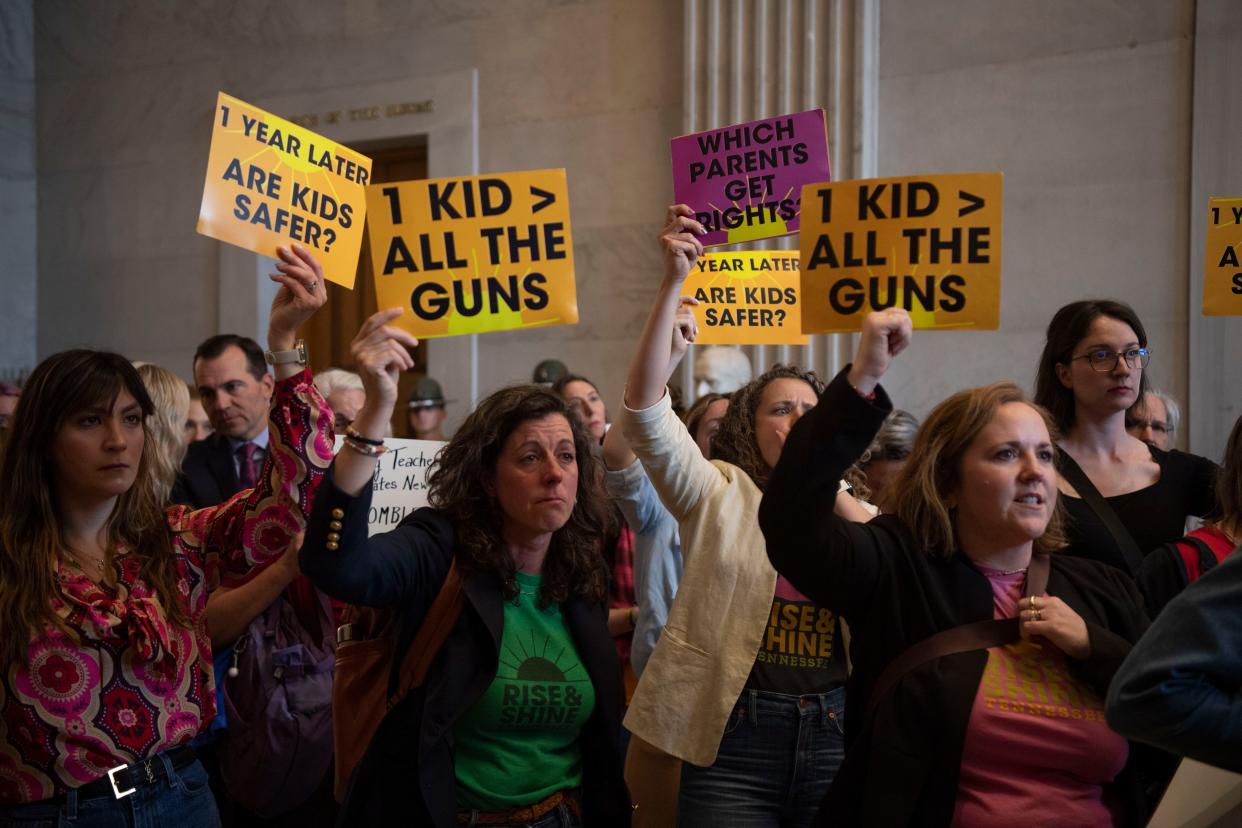 Protesters gather outside the Senate doors after being removed from the gallery at the Tennessee Capitol in Nashville, Tenn., Tuesday, April 9, 2024.