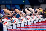 <p>(From L) USA's Robert Finke, Ukraine's Mykhailo Romanchuk, Germany's Florian Wellbrock, Austria's Felix Auboeck, Australia's Jack Alan McLoughlin and Italy's Gregorio Paltrinieri dive to start the final of the men's 800m freestyle swimming event during the Tokyo 2020 Olympic Games at the Tokyo Aquatics Centre in Tokyo on July 29, 2021. (Photo by Odd ANDERSEN / AFP) (Photo by ODD ANDERSEN/AFP via Getty Images)</p> 