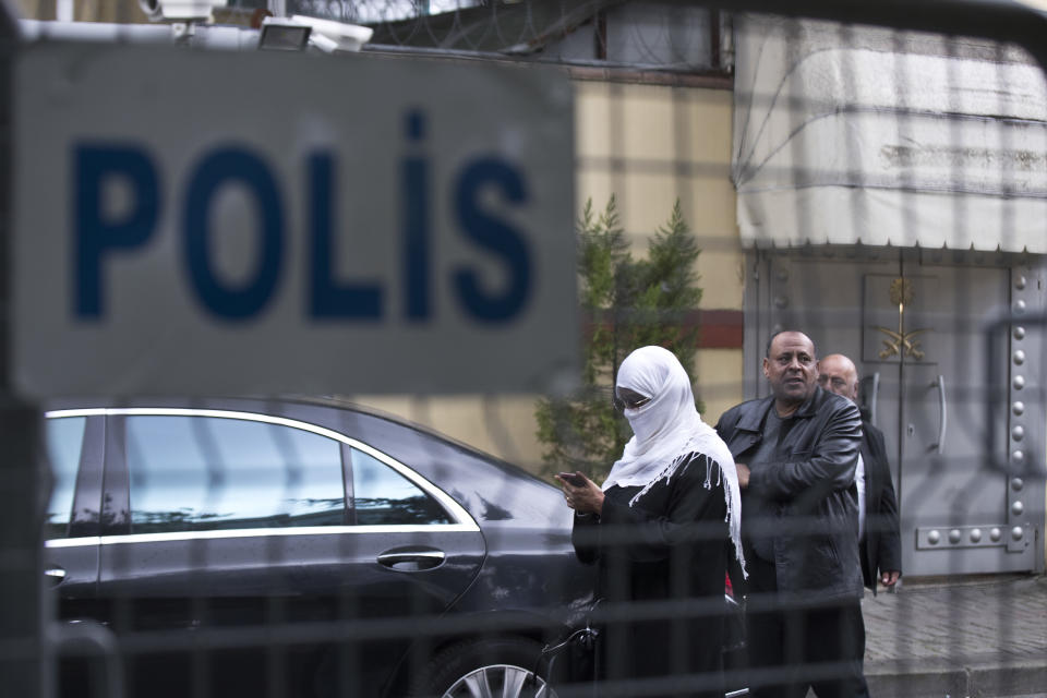 Visitors leave the Saudi Arabia's consulate in Istanbul, Turkey, Monday, Oct. 15, 2018. Saudi journalist writer Jamal Khashoggi, is thought to have vanished after he walked into the consulate on Oct. 2, leading to worldwide speculation over his disappearance. (AP Photo/Petros Giannakouris)