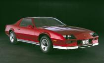 <p>Truly all new, the 1982 Camaro used a full unitized structure, a new coil-spring rear suspension, and struts in the front. And for the first time, the Camaro was a hatchback. But while the new Camaro was modern and gorgeous in that flat-plane 1980s way, it was seriously underpowered. Base Sport Coupes were equipped with the heinous 2.5-liter "Iron Duke" four-cylinder rated at 90 horsepower. A 112-hp, 2.8-liter V-6 was optional while the Z28's base 5.0-liter V-8 with a four-barrel carburetor put out only 145 ponies. But at least that engine could be had with a four-speed manual transmission. Opting for the 165-hp Cross-Fire-injected version of that engine meant going with a three-speed automatic.</p>