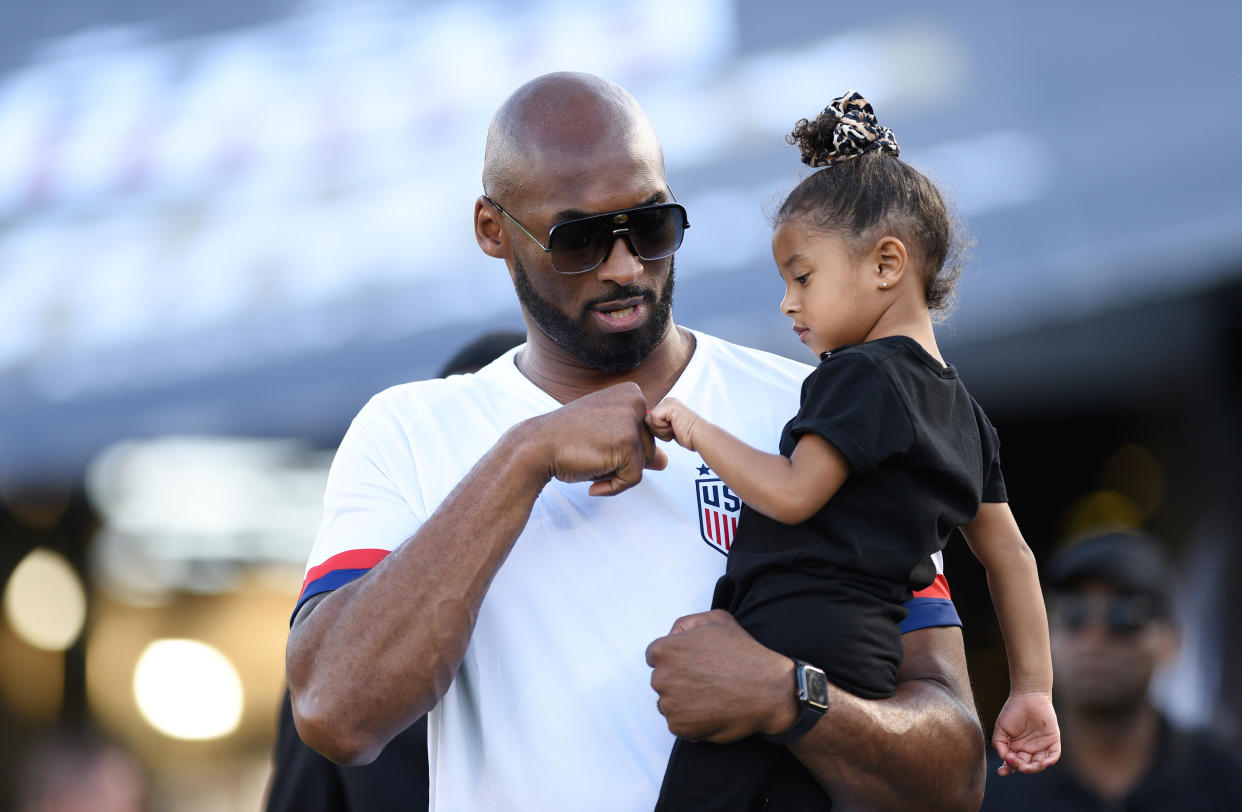 Proud "girl dad" Kobe Bryant shares a moment with daughter Bianka Bella.