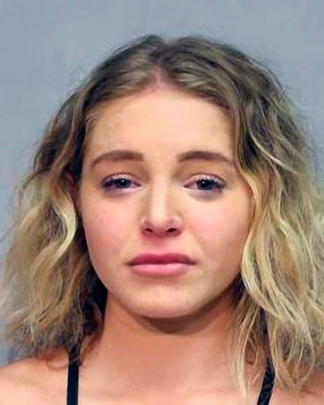 Courtney Clenney is seen following her arrest Wednesday in Hawaii for second-degree murder with a deadly weapon. (Photo: via Associated Press)