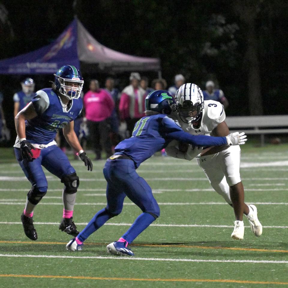 Somerset's Tayegan Briskey tackles an American Heritage ball-carrier during a regular season game on oct. 13, 2023.