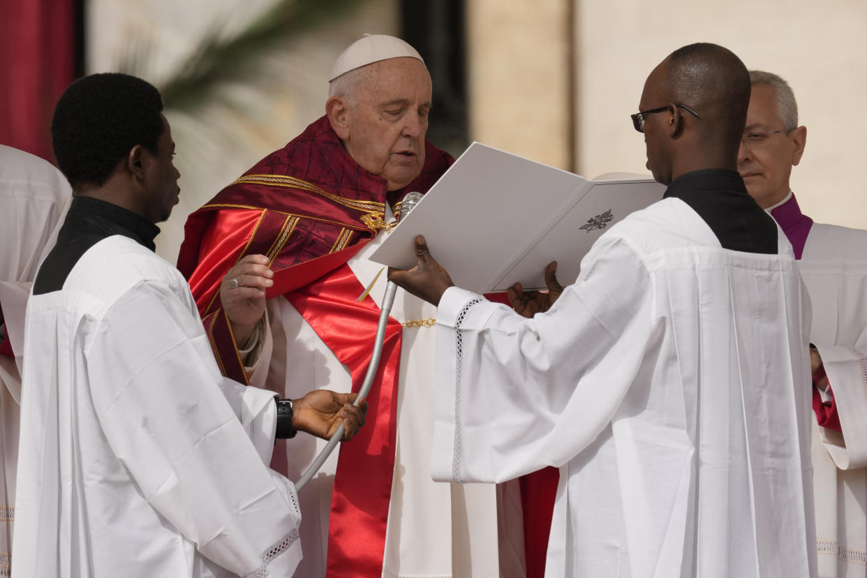 Pope Francis celebrates the Palm Sunday's mass in St. Peter's Square at The Vatican Sunday, April 2, 2023 a day after being discharged from the Agostino Gemelli University Hospital in Rome, where he has been treated for bronchitis, The Vatican said. The Roman Catholic Church enters Holy Week, retracing the story of the crucifixion of Jesus and his resurrection three days later on Easter Sunday. (AP Photo/Andrew Medichini)