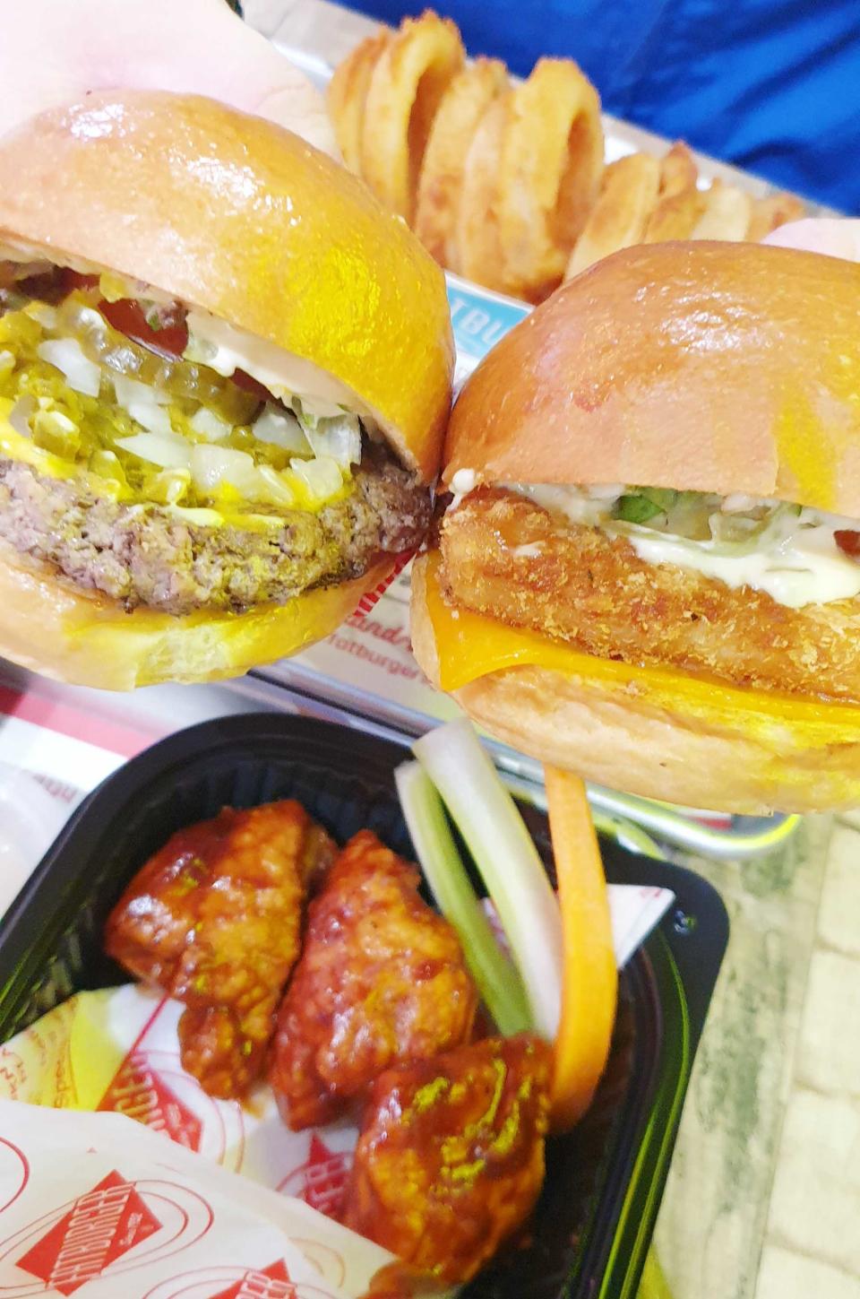 L: Original Burger R: Fish Burger T: Onion Rings B: Boneless Buffalo Wings (Photo: Stephanie Zheng) 