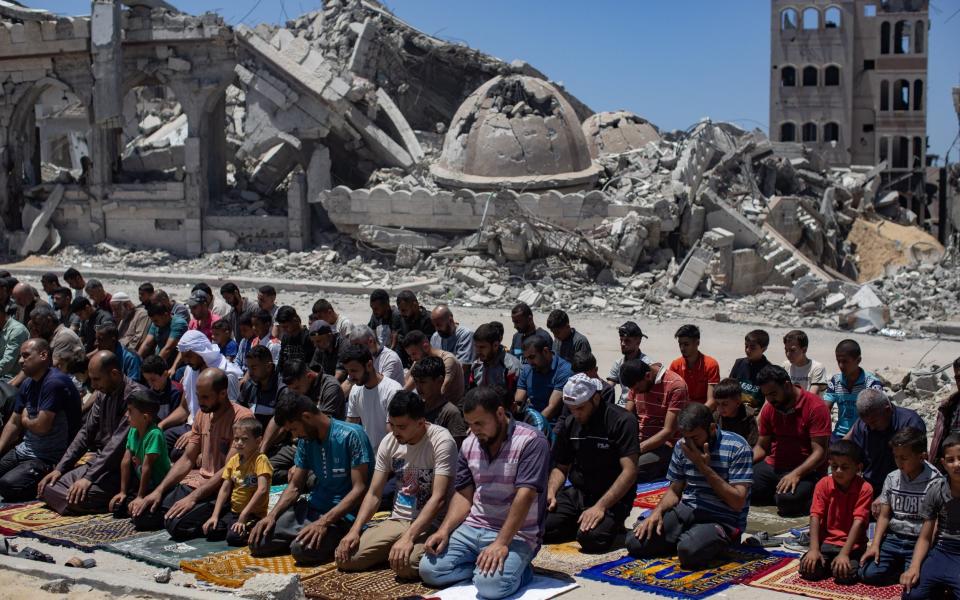 Mandatory Credit: Photo by HAITHAM IMAD/EPA-EFE/Shutterstock (14506111d) Internally displaced Palestinians perform the Friday prayer next to the ruins of the Al-Islam Mosque, which was previously destroyed in an Israeli airstrike, in Khan Yunis, southern Gaza Strip, 24 May 2024. More than 35,000 Palestinians and over 1,400 Israelis have been killed, according to the Palestinian Health Ministry and the Israel Defense Forces (IDF), since Hamas militants launched an attack against Israel from the Gaza Strip on 07 October 2023, and the Israeli operations in Gaza and the West Bank which followed it. Friday prayer near mosque's rubble in Khan Younis, Gaza - 24 May 2024