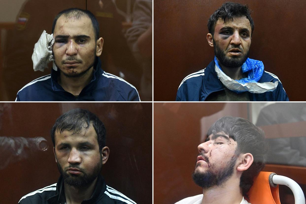 The suspects, clockwise from top left: Murodali Rachabalizoda, Dalerdzhon Mirzoyev, Muhammadsobir Fayzov and Shamsidi Fariduni, appear in court (AFP/Getty)
