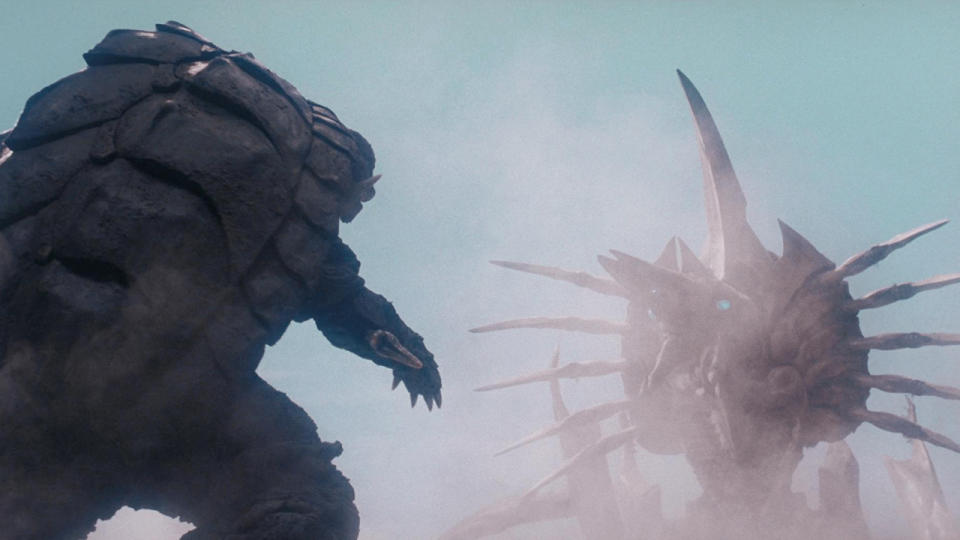 Still from the movie Gamera. Here we see Gamera, a giant turtle, fighting against a giant insect-like creature.