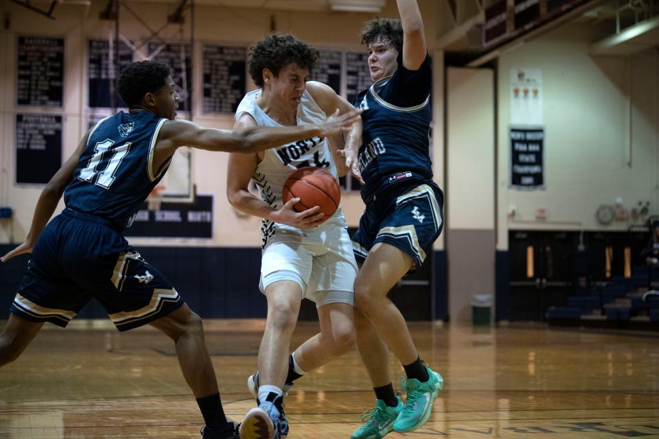 CR North senior Adam Mahtat drives through Lower Moreland defense in a December game.